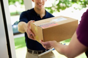 courier-driver-parcel-delivery-at customer-door